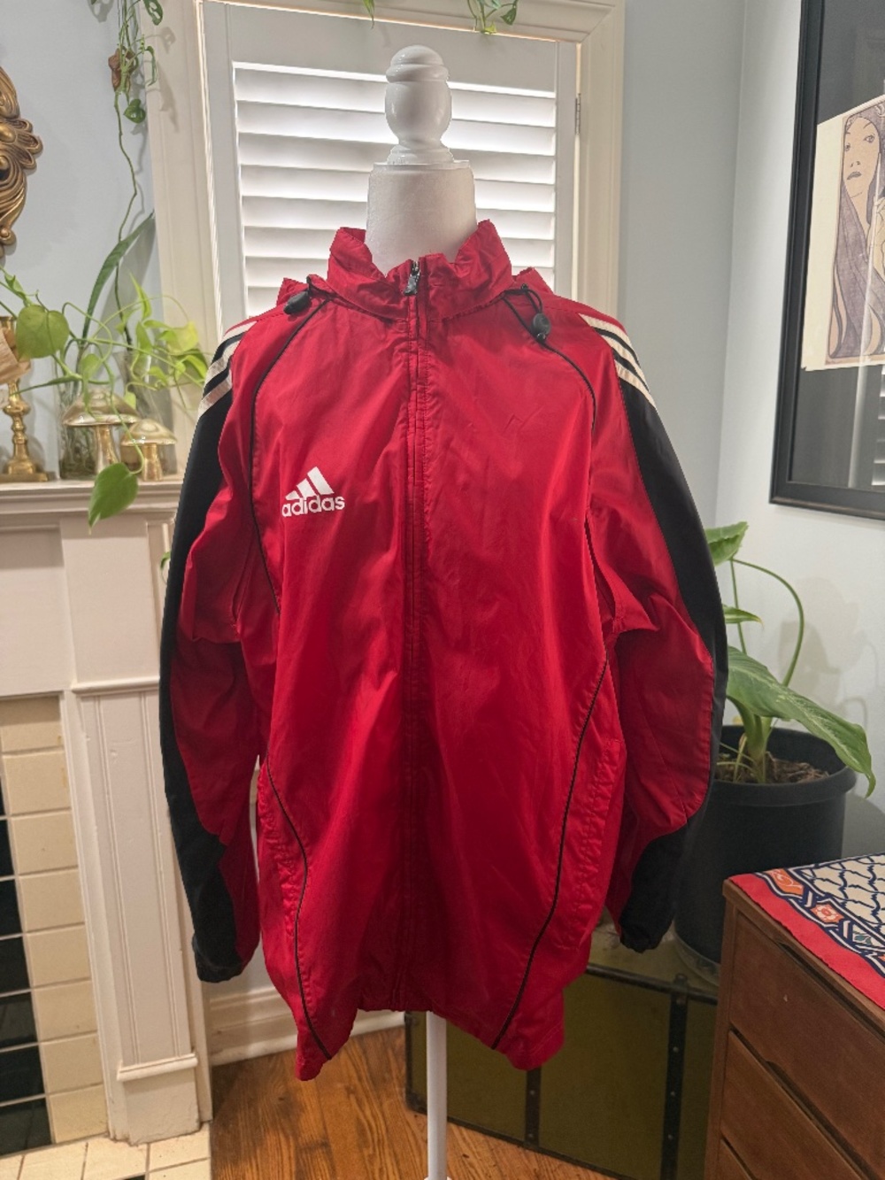 Classic Adidas three striped windbreaker.